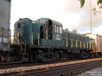 There's a funny story behind this photo. Delaware Lackawanna, a regional railroad with a major jones for purchasing old American Alco power, purchased this old former Delaware & Hudson RS3 from tourist operator York-Durham Heritage Railway. "DL 4068" arrived at CP's Agincourt Yard about a week or two ago, and basically fell off the radar since. Nobody knew when it was to leave or on what. <br><br> Fast forward to today: after being tipped off the first completed brand new GO Transit MP40PH-3C was sitting at Lambton/West Toronto yards awaiting delivery, the ever-adventurous photographer makes a second trip downtown in an attempt to catch a shot of it. Upon arriving on the scene, and heading trackside, he finds the crew of CP westbound #254 stopped and giving a roll-by to a passing eastbound near the yard area. Casually asking the crew if they've seen any new GO locomotives sitting around, one replies something along the lines of "No, but we've got some old locomotive in the train a few cars back". This was followed by a "Hmmm" moment, and then an "Ahhh!" upon looking down the train and realizing what it might be. <br><br> The crew then climbs back aboard their train and slowly gets it underway. Two cars down in-train was the dead RS3, beat up and ratty looking, heading for its new owner in the US to be rebuilt, repainted, and put back in service. <br><br> <a href=http://www.railpictures.ca/?attachment_id=2592><b><u>Alternate photo of the train near the yard.</u></b></a> <br><br> (And I got the GO unit too, but we'll leave that for another day...)
