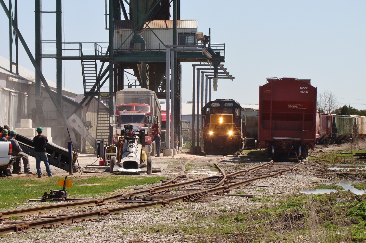Crews patiently wait for CSX to drop cars for loading and unloading at the SouthWest CO-OP Elevator in Wallaceburg. This scene will be a thing of the past as soon as CANDO takes over this operation. It really is hard for me to believe that a class 1 American railway has stuck around this area for so long to serve a couple of grain elevators.