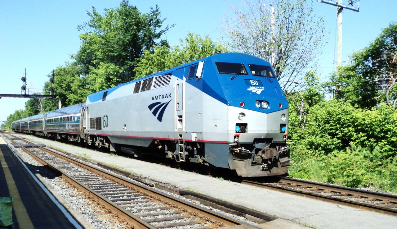 Amtrak loco 150 A P42 DC pulling 5cars on rte 68 Adirondack Montréal to New York (they change crew and loco in Albany N.York state today was on north track because the CN rte 120 to Halifax was on South track nice morning but cold
