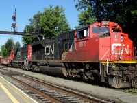 CN-8810  SD-70-M2 leading loco with behind CN-5426 a SD-50-F  pulling a convoy of mix cars going to Halifax N.S. making a few drops on is way to Halifax it was on north du he had to make a drop in Southwark yard so AMT had to come on south track so all passangers waiting at the station had to walk to vi rail station tha I do see to often it show that CN have priorite