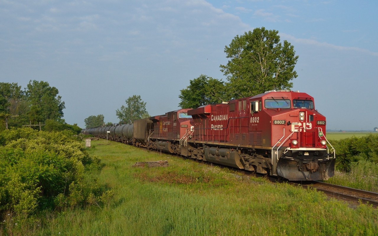 CP 608 heads eastbound on the approach to the Ringold Diamond with 80 loads of crude oil. This is one of the reroutes due to the trestle collapse near Sudbury.