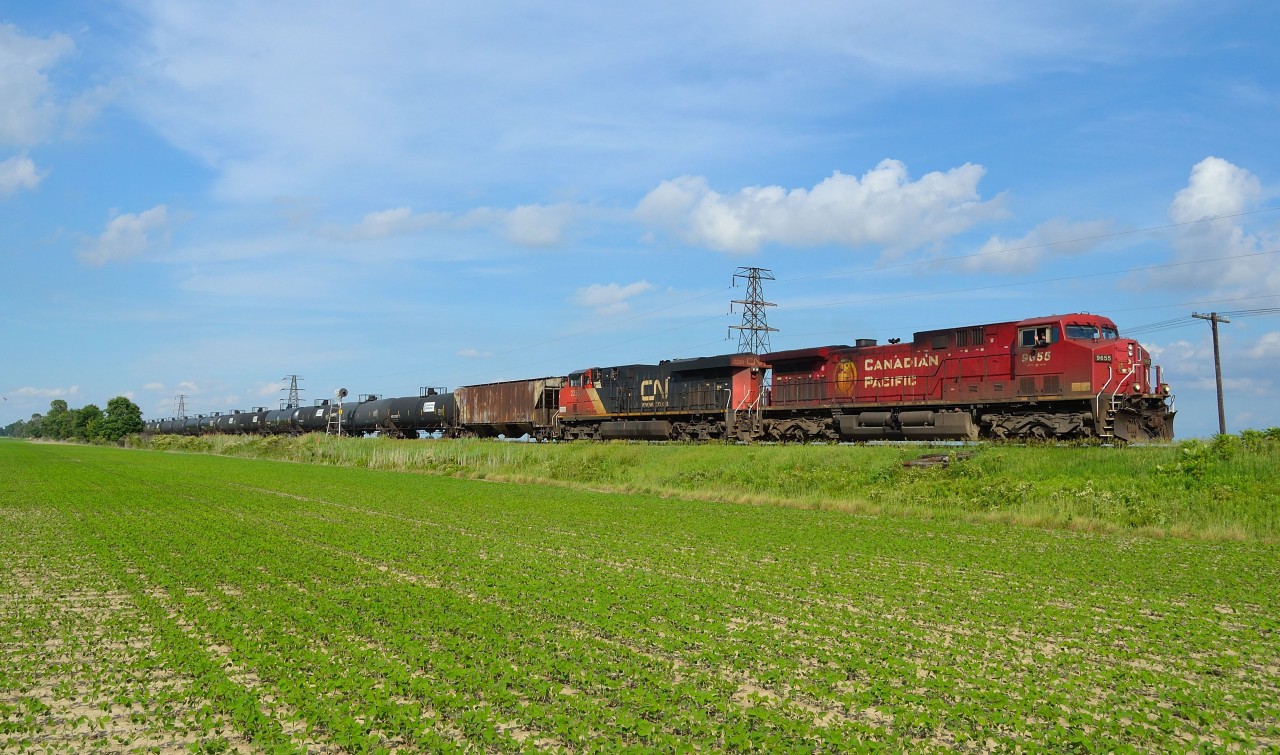 CP 641 heads westbound towards Walkerville as it approaches Tilbury with a CN unit trailing.