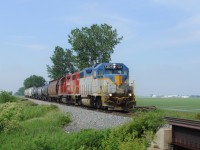 Leading CP T29 (formerly T76)is CP 7304 still baring its D&H paint scheme. The water laying in the track side feild prove that the spring of 2013 has been hard for farmers but Mazex seed in the background has been making good money selling seed to farmers to replant.