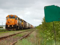 Work 1808 returns west to Hearst with the Agrium Turn. Loaded with potash in tow as they begin to traverse a slow order at Opasatika. 