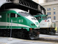 Back in GO Transit's F59 to MP40 transition era, we find two green and white noses sticking out of the Union Station train shed: one sleek, modern and styled, the other square, homely and utilitarian. GO MP40 613 and F59 541 await departure time as the clock ticks forward during evening rush hours.