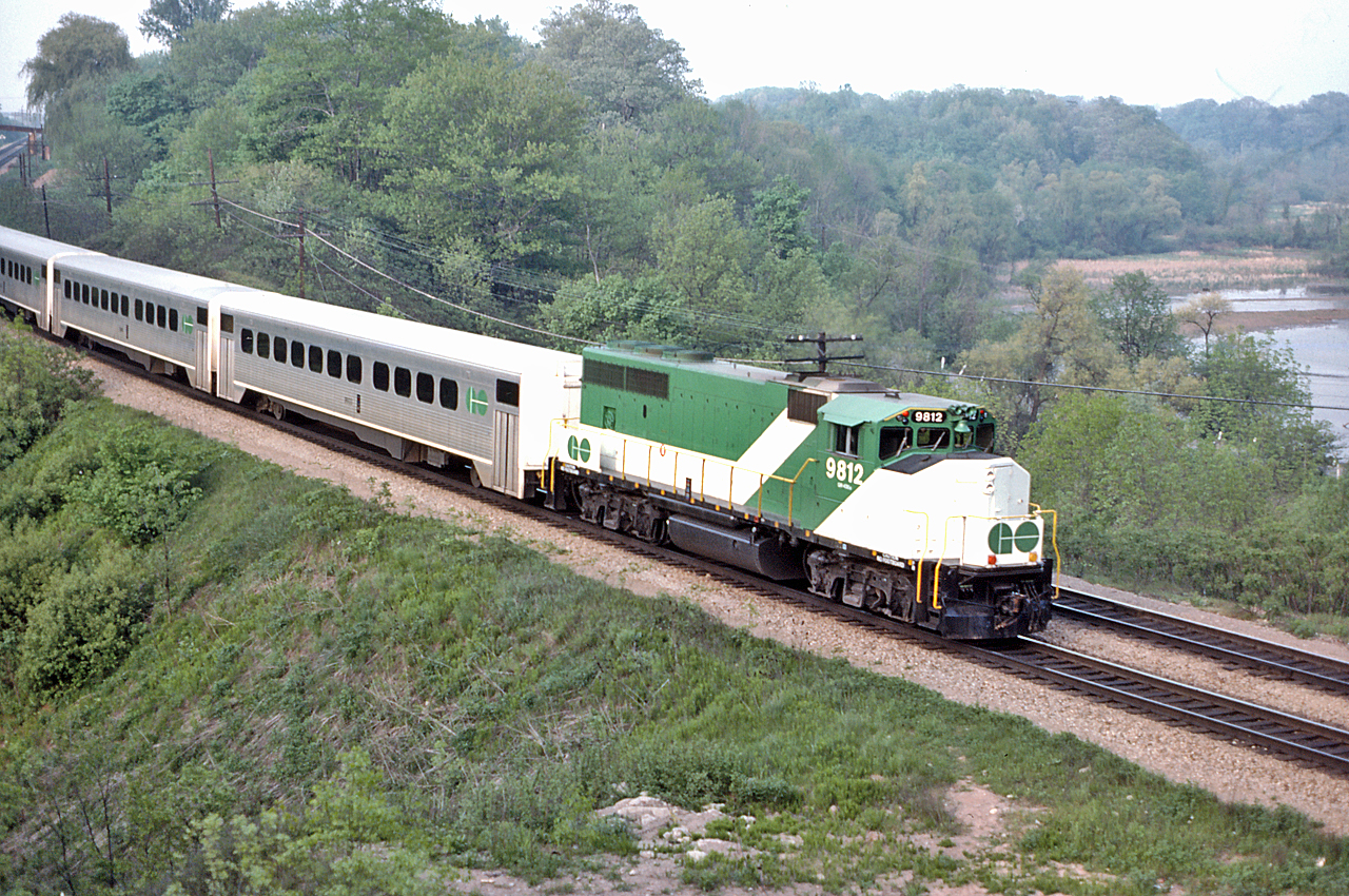 GO 9812 brings up the rear of a Hamilton GO train deadheading back to Toronto in May of 1975.