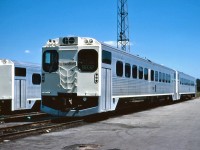With the Air Port Rail Link scheduled to open in the next few years, GO will receive some DMU's to use on this new train service.  However GO used to have DMU units in the past.  9832 sits at the Willowbrook shop in 1972, with a Hamilton destination board.