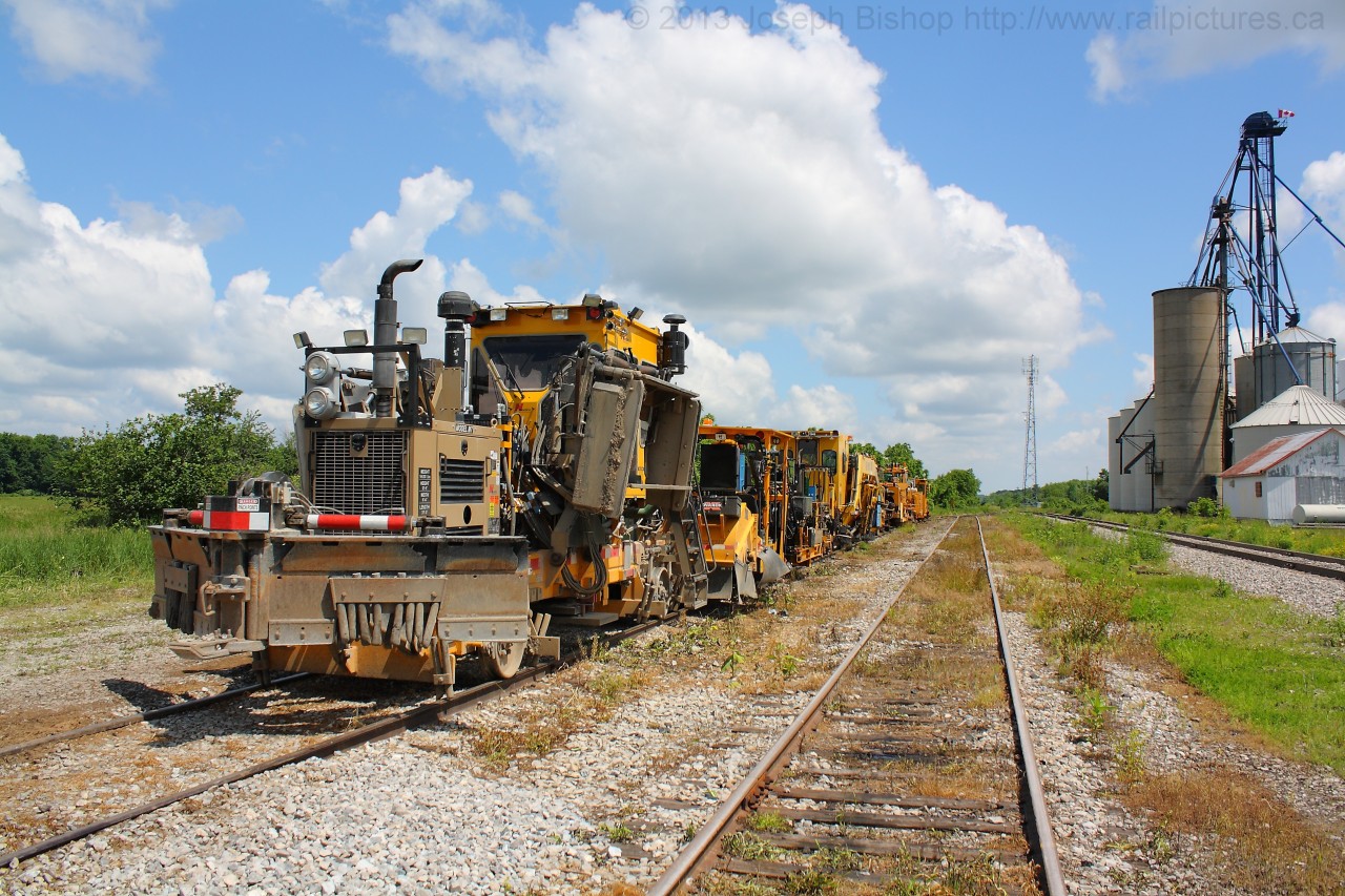 Track gang equipment rests in Hagersville on a warm June morning.  There will be quite a bit of track work happening on the Hagersville Subdivision in the next few weeks.