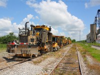 Track gang equipment rests in Hagersville on a warm June morning.  There will be quite a bit of track work happening on the Hagersville Subdivision in the next few weeks.