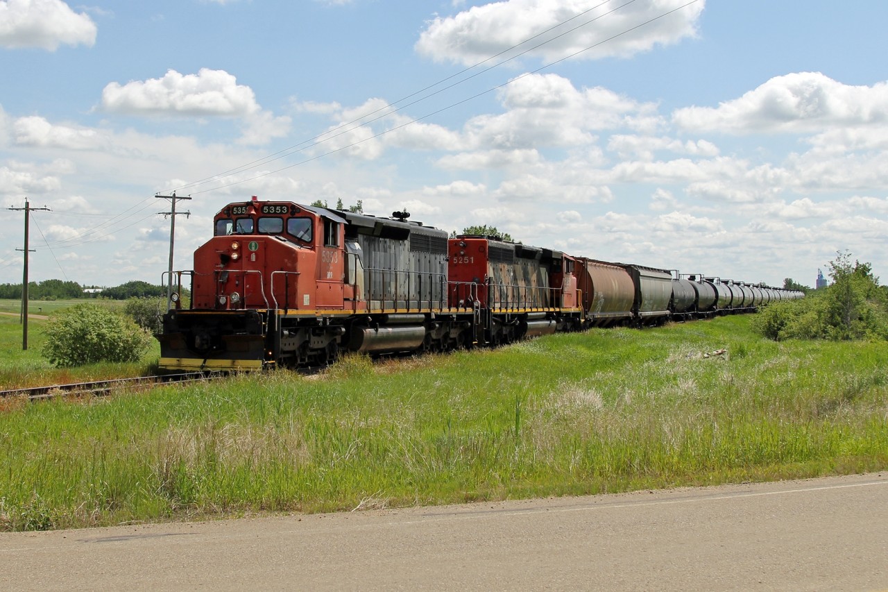 Battle River Railway's ex-CN SD40-2(W)s 5353 and 5251 head towards Camrose as the travel west on the former Alliance subdivision.