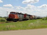 Battle River Railway's ex-CN SD40-2(W)s 5353 and 5251 head towards Camrose as the travel west on the former Alliance subdivision.