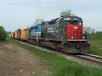 A late running GEXR 432, with the ex Southern Pacific tunnel motor in charge, follows VIA 84 westward out of Kitchener. 