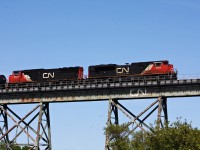 CN's 314 with a thunder cab leads it over the trestle. These units are a bit of a favourite because there are so few of them built to NS specs. But thankfully for the CN transportation boys there were only a few of them.