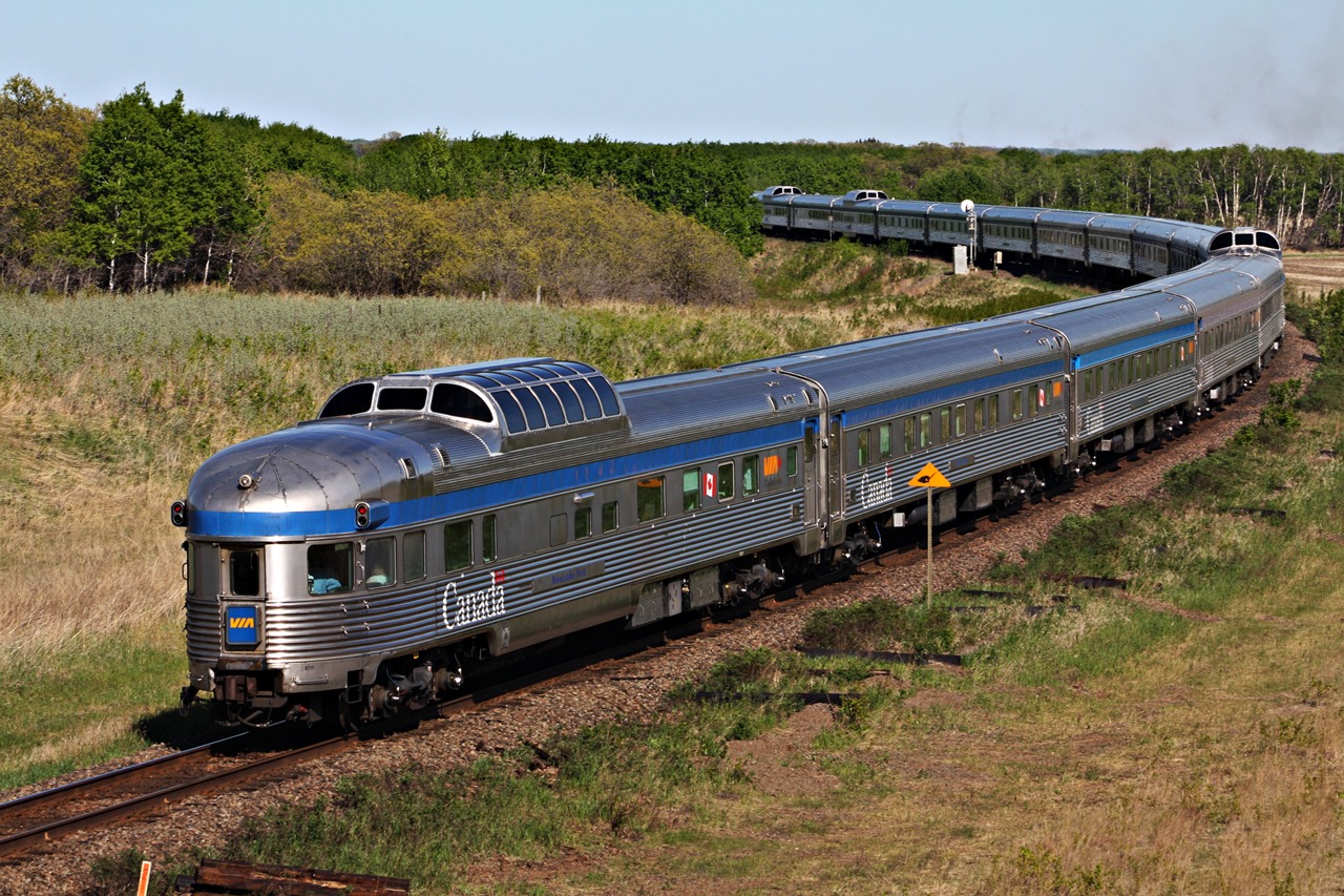 VIA 2 heads east to Winnipeg Manitoba as it is about to call for the signal at Levine