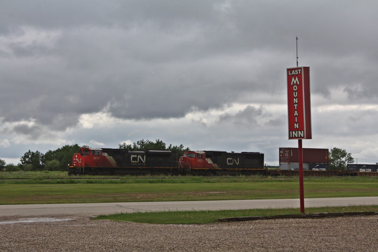 CN 102 rolls by the Last Mountain Inn which is going to become my home for the next few months at Watrous Saskatchewan as we work on the CN Lanigan Spur east of town. This photo was taken from my doorway what a view of the tracks.