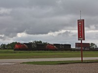 CN 102 rolls by the Last Mountain Inn which is going to become my home for the next few months at Watrous Saskatchewan as we work on the CN Lanigan Spur east of town. This photo was taken from my doorway what a view of the tracks. 