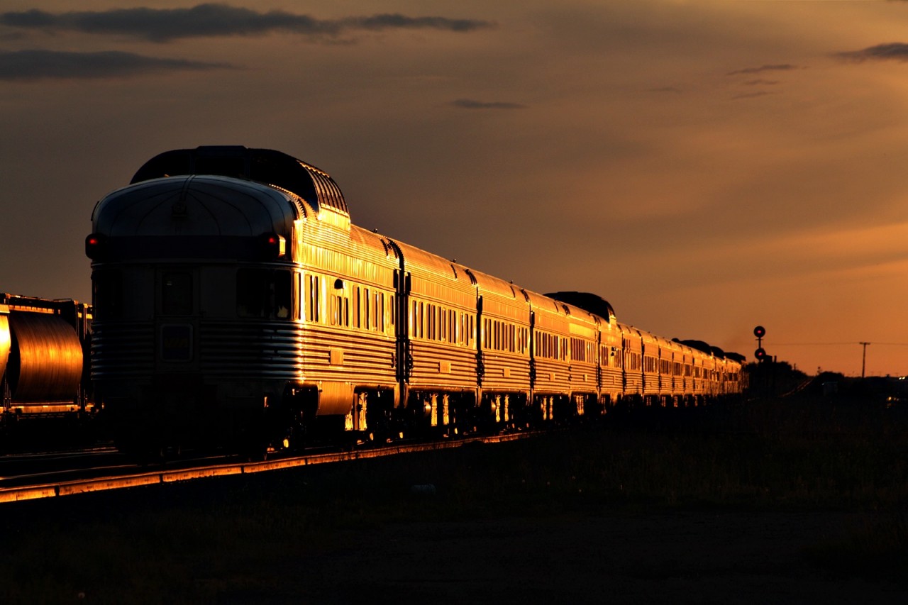 After finishing a days work I was sitting in my motel room across the tracks in Watrous Sk that Cando had put us up in and while sipping on a ice cold brew I happen to remember that the day was Monday and the Via usually shows up around 2000-2100 in Watrous as soon as I flipped on the radio in the work truck I heard Via 1 call for Kitella which is east of Watrous I hopped in my truck and drove down to the bunkhouse to catch this beauty of a train pull into Watrous for a quick station stop during a nice sunset. This is one reason I decided that I would take up an offer to go work in Watrous on CN's Lanigan Spur so I can go catch some mainline CN action after spending the last 4 months on the CN branchline working.