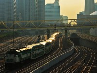 One of the last remaining F59PH's shoves an L10L consist into Toronto Union Station. Notice the cab car behind the locomotive. This would normally be the control cab at this end of the train, with the MPI unit at the far end, however a few consists have this configuration.