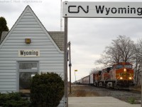 <b>BNSF</b> power leads CN Train 391 by the diminutive station at Wyoming - ultimately a flag stop. This was one of about six Foreign Power consists for the day, how times have changed.
<br><br> For a log of the Foreign Power for the day, see this entry by Rob Eull: 
http://finance.groups.yahoo.com/group/FPON/message/2550