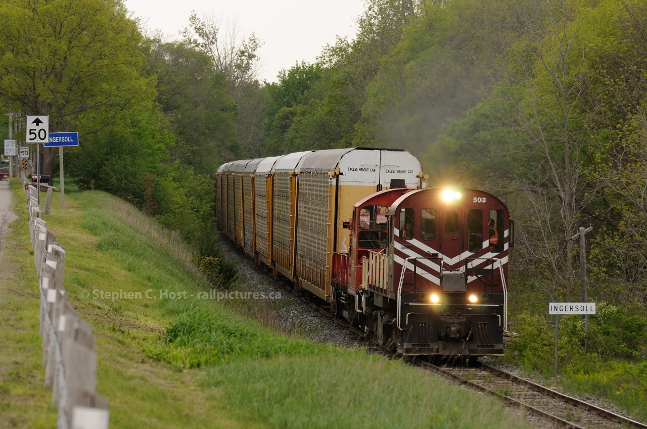 Where are we again? Oh, yeah. A rocket (MLW RS23) and a pup (GMD SW1200RS) sure sound like rocket-puppies as they are in notch 8 accelerating out of Ingersoll, Ontario - to track speed (25/30 MPH) on the St. Thomas Sub.