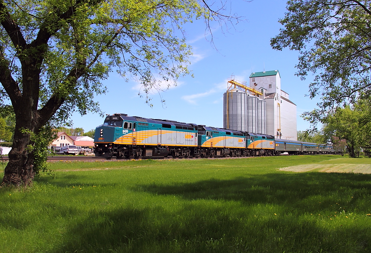 VIA's westbound "Canadian" blasts through Oakville with three units and 28 cars.
