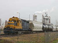 [Editors note: accepted for rare operation ] KNCX 2268, the "Koch Switcher" switches some cars at the Koch Fertilizer Plant. It appears to be an ex-Santa Fe GP9u. If that's the case this unit could have been pulling trains over the Cajon Pass or just switching cars in San Bernardino back in its day.