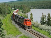 CN C40-8 2102 and IC SD70 1009 bring train A417 to a slow to enter the siding at Swan Landing to interchange traffic with the Grande Cache Sub.