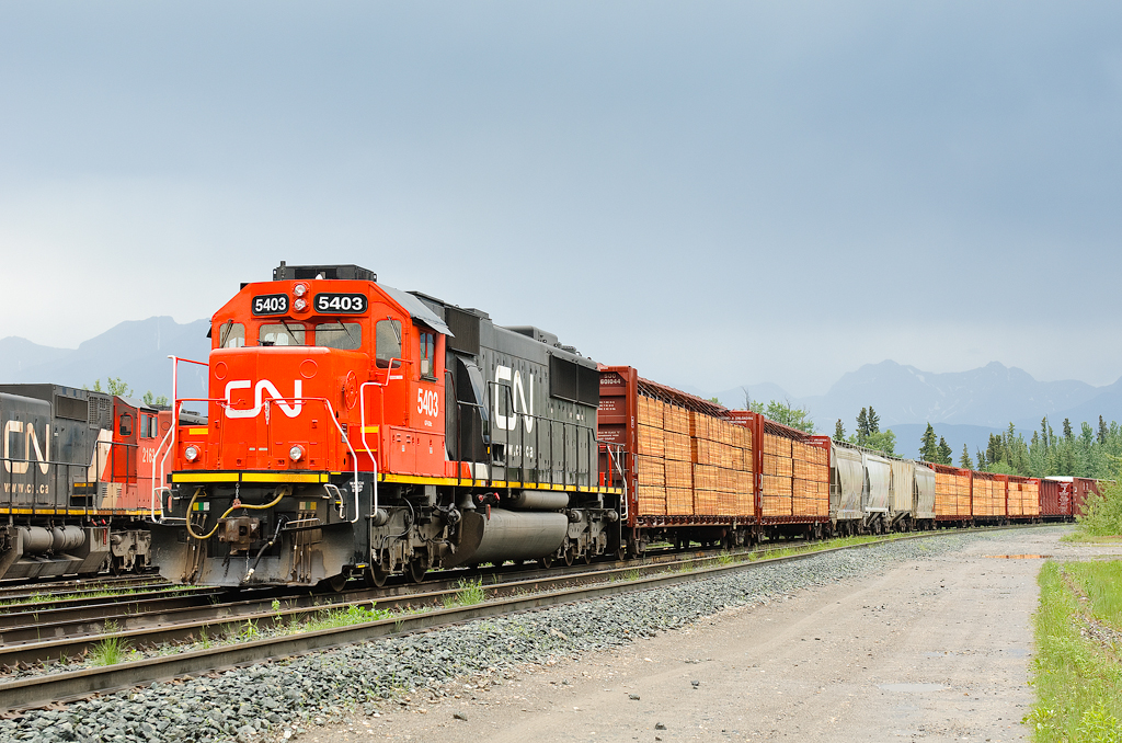 CN SD60 5403 was supposed to lead train A458 north tonight, but upon further inspection by the crew, it was not to be. It's seen here on top of their train, in track YB12 at Swan Landing. Unfortunately for the crew, the only other northward facing unit was the CN 5428, so they couldn't get away from having a loud former Oakway leader. Fine with me!