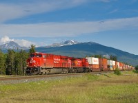 CP ES44AC 8933 creeps towards the approach signal to Henry House on CN's Edson Sub, following CN's train M304 who is waiting to meet train B759 and Q101 at the end of the double track. This is CP's train 198-22 detouring as CN train F30051 23 from Coho, BC to Edmonton, AB.