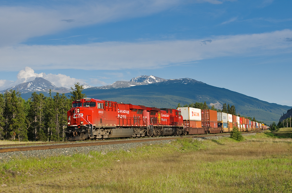 CP ES44AC 8933 creeps towards the approach signal to Henry House on CN's Edson Sub, following CN's train M304 who is waiting to meet train B759 and Q101 at the end of the double track. This is CP's train 198-22 detouring as CN train F30051 23 from Coho, BC to Edmonton, AB.