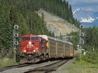 Detouring due to washouts on CP's Laggan Subdivsion, CP Train 100-20 (running as CN train F40251 20 between Coho, BC and East Edmonton, AB) crosses down to the south track of the CN Albreda Sub at Geikie. 