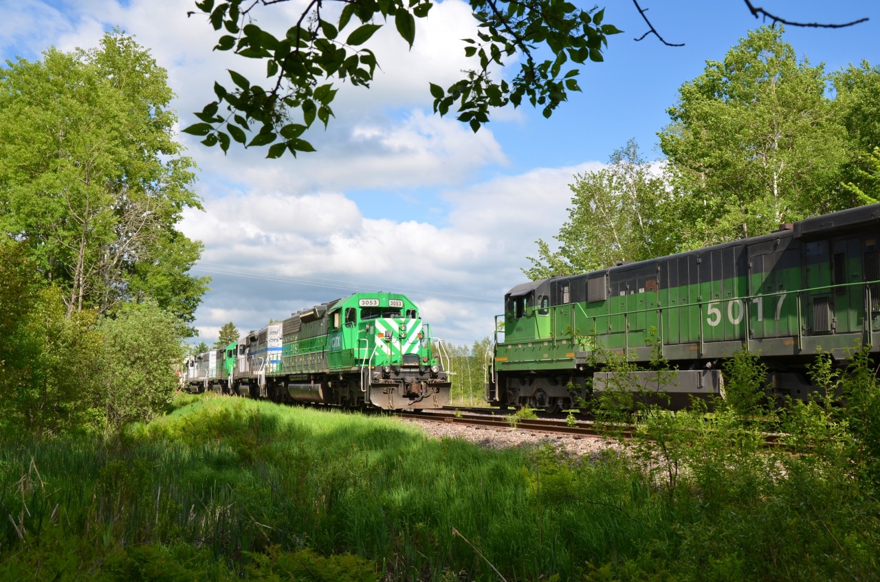 MMA  train 1 lead by  CITX SD40-2 lease units meets east bound oil train at Foster, QC