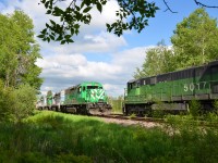 MMA  train 1 lead by  CITX SD40-2 lease units meets east bound oil train at Foster, QC