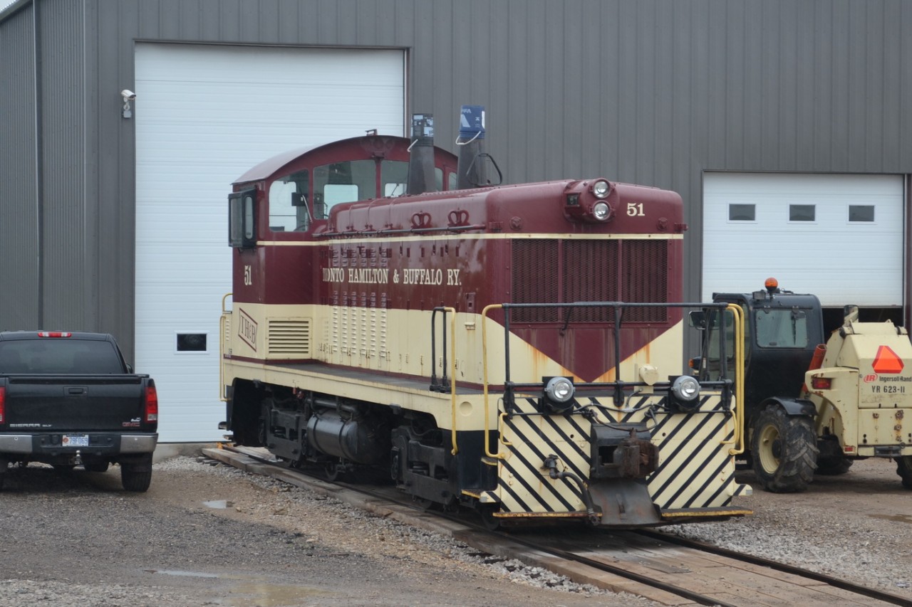 exTH&B #51 is sitting outside the OSR Shops in Salford, in the middle of a Rainstorm, with buckets over top of it's Exhaust stacks. It was nice and clean and all polished up(which may because of the wet body from the rain), and relaxing waiting for its next service.