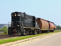 At this point I had my fingers crossed hoping that the kind engineer would open up the throttle and really lay on some of that thick black smoke that ALCO's are so famous for, but no luck. Either way I still feel fortunate to have been able to shoot such an attractive unit as an RS18u on such a beautiful day. Here 1859 is pushing two hoppers down to Southpier Terminals, this would be the end of the chase for us.