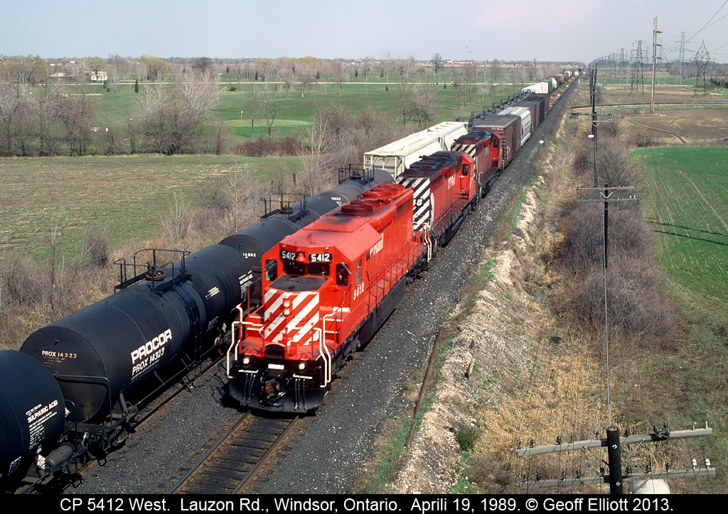 CP 5412 leads train #505 into Windsor and past an eastbound waiting to leave Begin/End CTC Sign Walkerville.