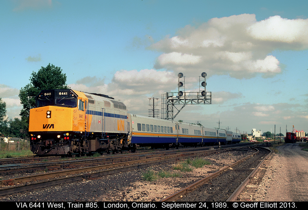 VIA #6441 has train #85, The International, well in hand as it approaches London Station on it's trip from Toronto to Chicago.  Note the lone Amtrak car mixed in the consist as well.