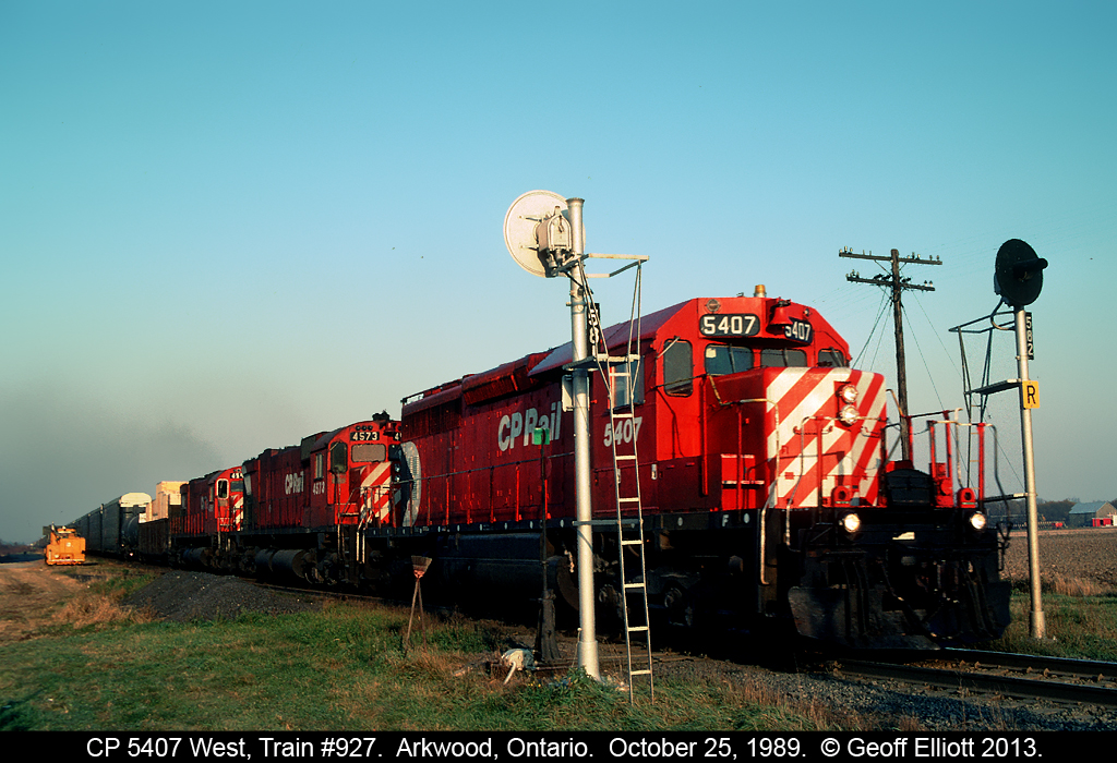CP 5407, an ex-QNS&L SD40-2, leads Train #927 in the late light of the day as it splits the signals @ MP 58.1 (Arkwood) on the Windsor Subdivision on October 25, 1989.