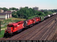 CP 5411 is in charge of a westbound 7xx series Acid Train as it arrives in London Yard for a crew change before continuing west to Windsor.  This train originated in Sudbury, and once in Windsor this train will be interchanged to either Conrail, Norfolk Southern, or the Essex Terminal depending on it's final destination.