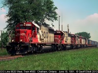 SOO Line 6620 leads a quartet of white SD40-2's on Train #500 as it bangs the CSX diamond in Chatham, Ontario while en-route to Chicago back in 1991.  With the sale of the remaining SOO units pending, albeit SD60's, it's nice to find gems like this in my collection.
