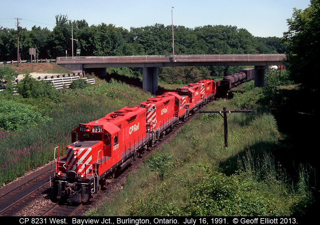Here's a quartet of matched CP GP9's on the "Ham Turn" today passing under Plains Road in Burlington, Ontario.  I'm standing in the Royal Botanical Gardens as many who frequent this page have spent time here I'm sure.