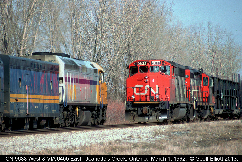 VIA #74, with 6455 leading, meets CN 9633, train #381, at Jeanette's Creek.  There is something to be said for double track when you have both freight and passenger service running on the same subdivision, however in CN's wisdom, the eastbound main has already been removed requiring that meets like this took place to slow the progress of, well, everything.....
