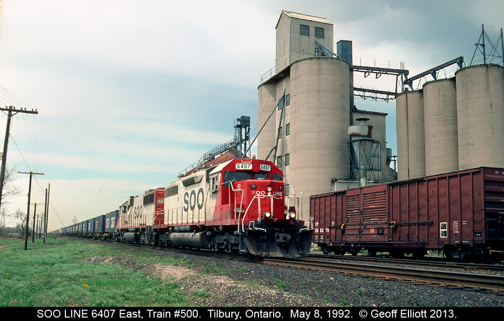 SOO 6407, ex-Illinois Central 6020, and a fairly fresh SOO SD60 make for an interesting pairing as they lead Train #500 east back on May 8, 1992.