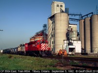 CP 5504 East, with a SOO Line half-sister, leads train 504 through Tilbury and past St. Clair Grain on September 5, 1992.