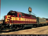 There was never a shortage of variety to the consists when I would go to Sault Ste. Marie in the Wisconsin Central era.  Here we have a WC GP40, an ACR F9B, and a WC SD45 that are being readied for their trip back across the border after having arrived in the Sault from the U.S. earlier in the day.
