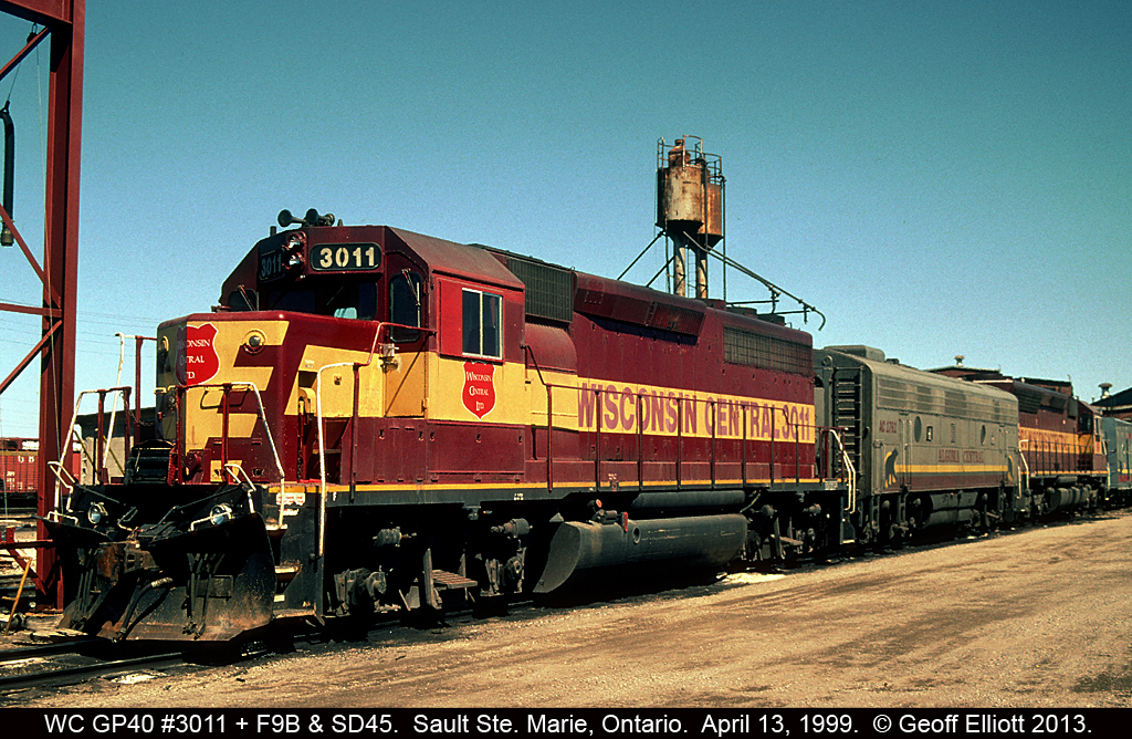 There was never a shortage of variety to the consists when I would go to Sault Ste. Marie in the Wisconsin Central era.  Here we have a WC GP40, an ACR F9B, and a WC SD45 that are being readied for their trip back across the border after having arrived in the Sault from the U.S. earlier in the day.