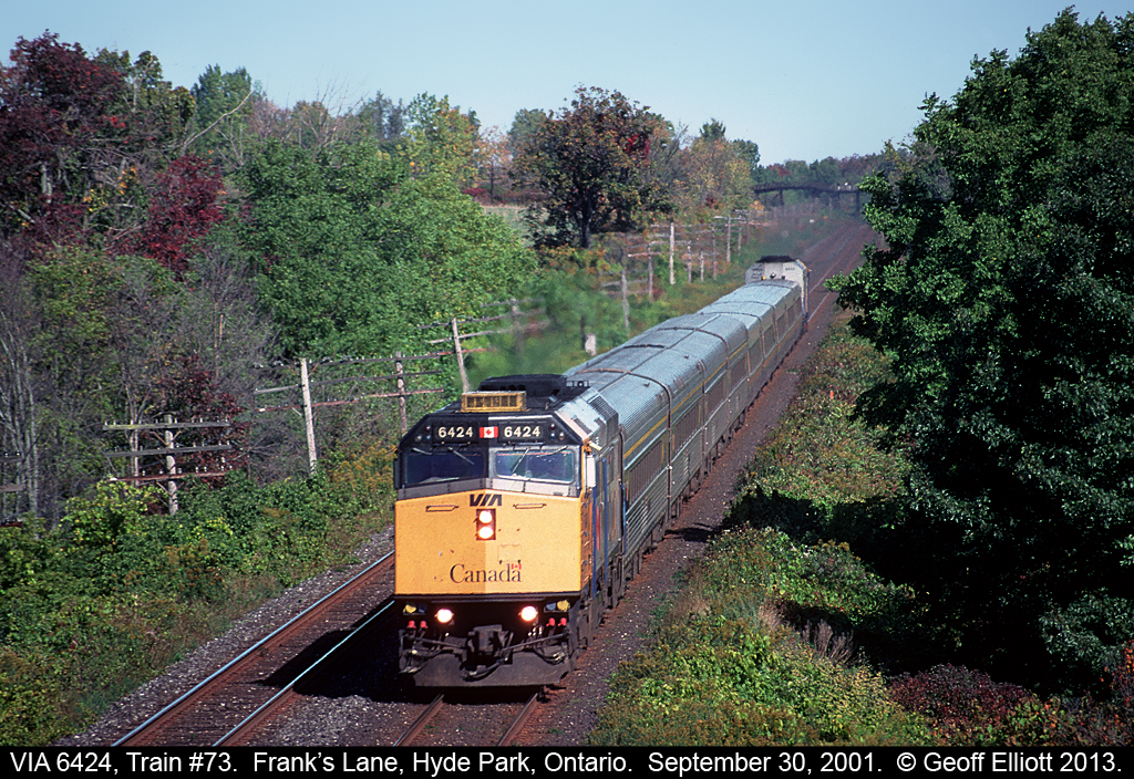 VIA #73, with VIA 6424 in command, heads west on the eastbound main between London and Komoka before diverging on to the Chatham Sub @ Komoka to continue it's trip on to Windsor.  Train has 2 back-to-back consists as VIA would send two full sets to Windsor like this so they would not have to 'turn' the train for the eastbound return trip to Toronto.