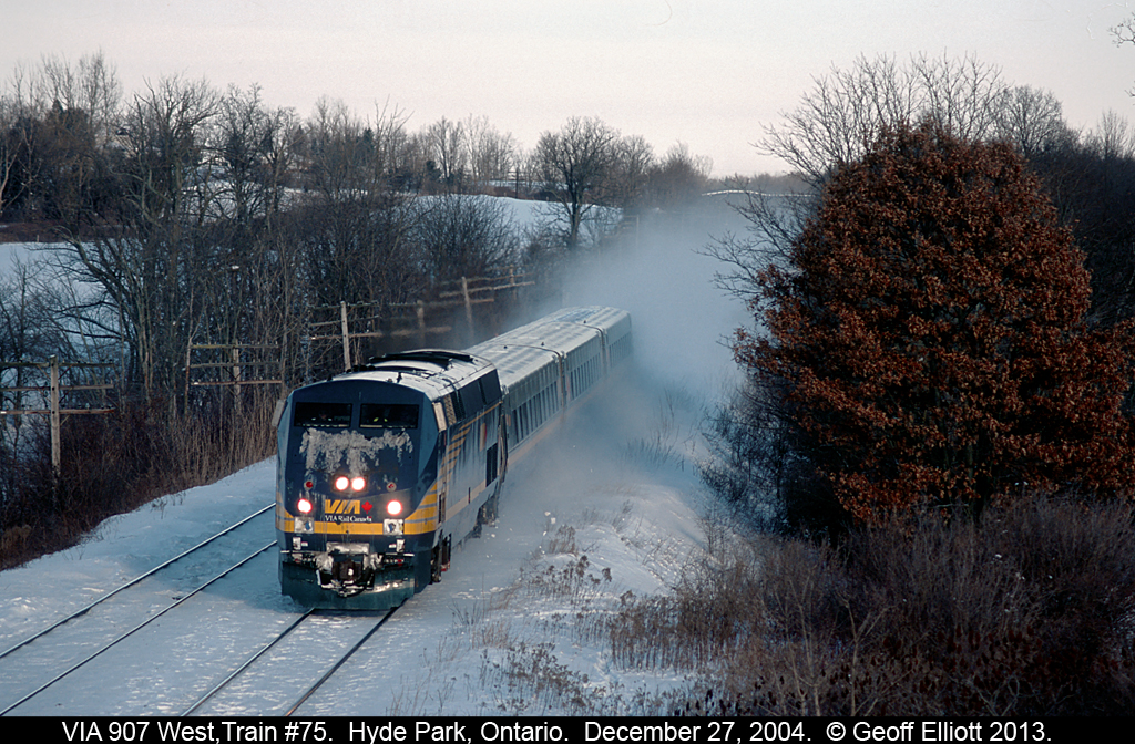 VIA #907 kicks it up in the late light of the day as it speeds down the eastbound main toward Komoka to make it's turn onto the Chatham subdivision before continuing on to it's final destination in Windsor.