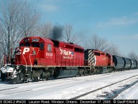 CP Rail Systems SD40-2 #5420, ex-KCS 675, leads a GMDD cousin westbound into the Walkerville siding in Windsor back in 2005.