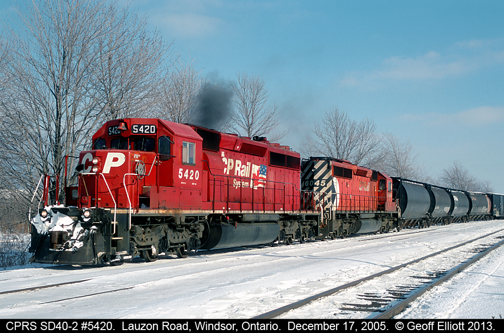 CP Rail Systems SD40-2 #5420, ex-KCS 675, leads a GMDD cousin westbound into the Walkerville siding in Windsor back in 2005.